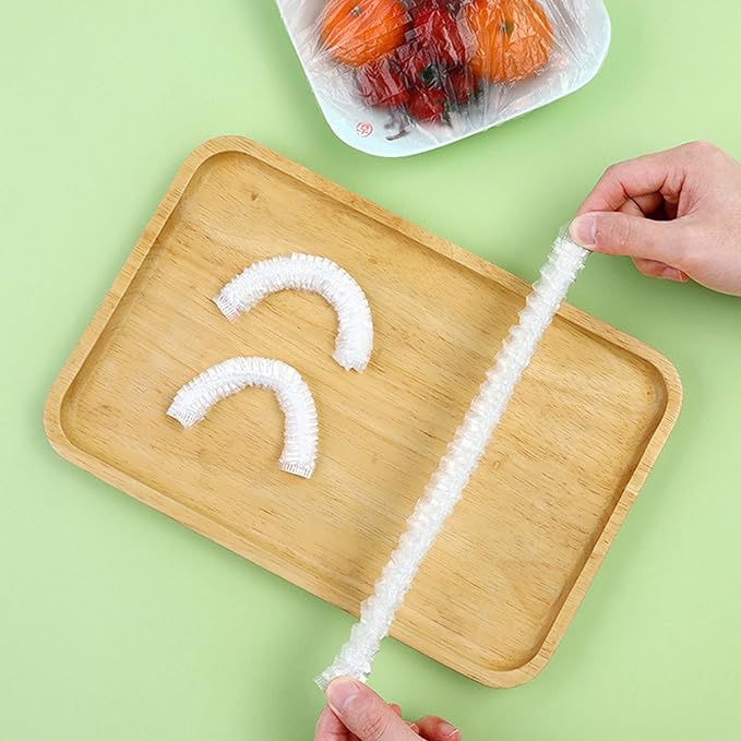 🥗 FreshSeal™ – Film Alimentaire Élastique Réutilisable (Pack 100 pièces)